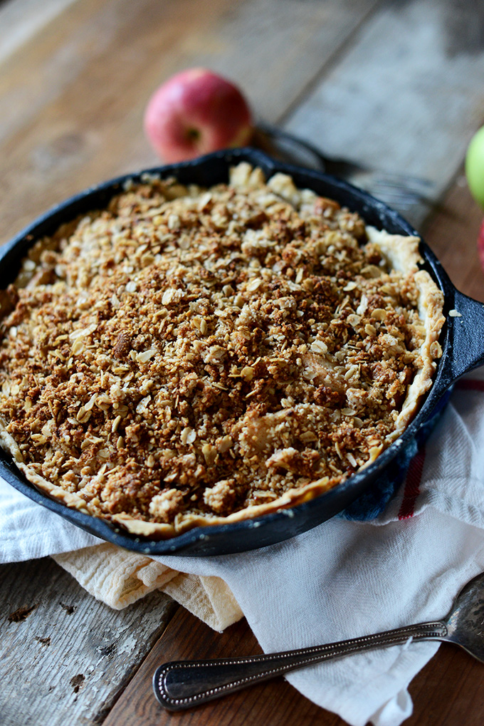 Cast-iron skillet filled with our Deep Dish Apple Crumble Pie