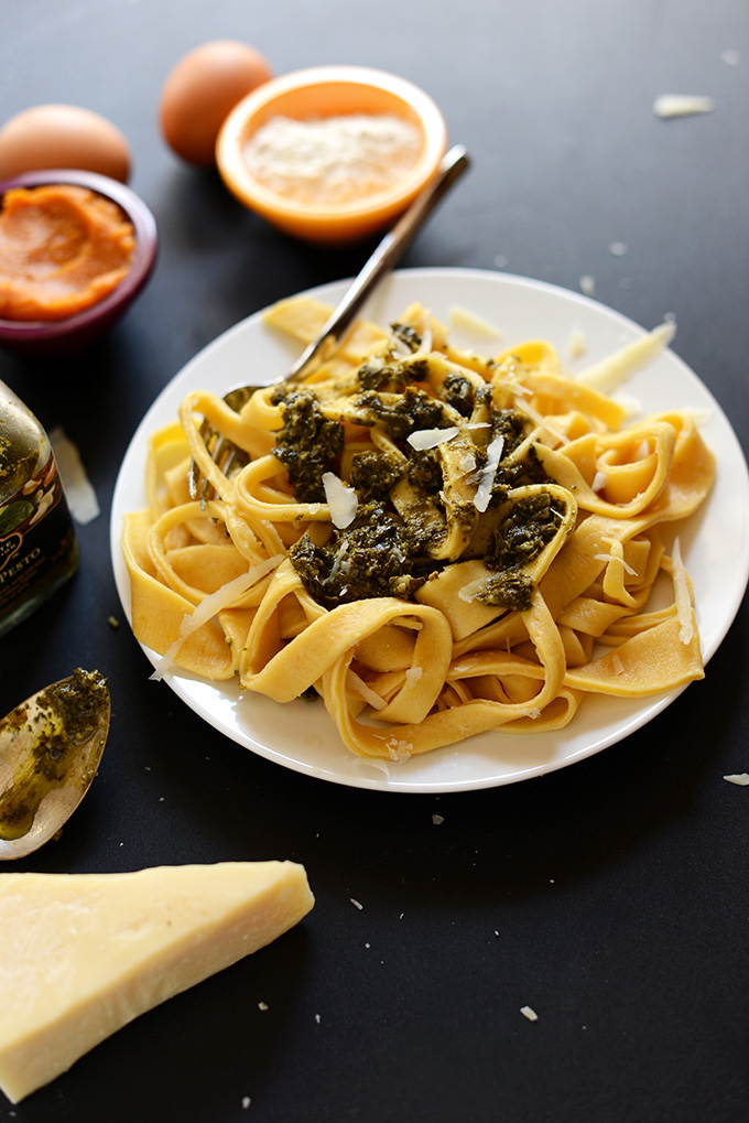 Plate of Fresh Pumpkin Pasta topped with pesto and parmesan cheese