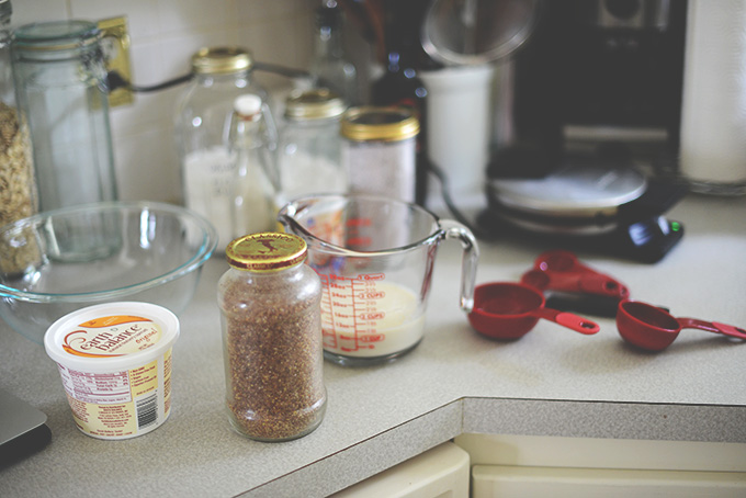 Counter with ingredients for making Gluten-Free Blue Cornmeal Waffles