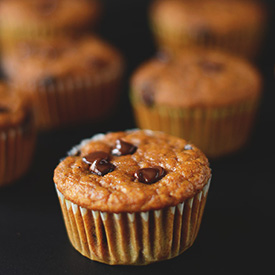 Batch of Pumpkin Chocolate Chip Muffins in paper liners