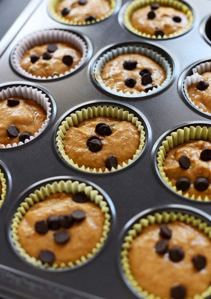 Muffin tin with a batch of Pumpkin Chocolate Chip Muffins recipe