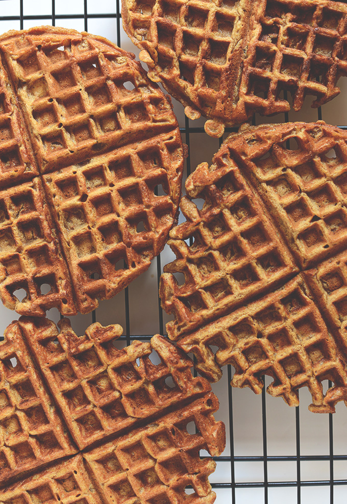 Homemade Pumpkin Spice Waffles cooling on a baking rack