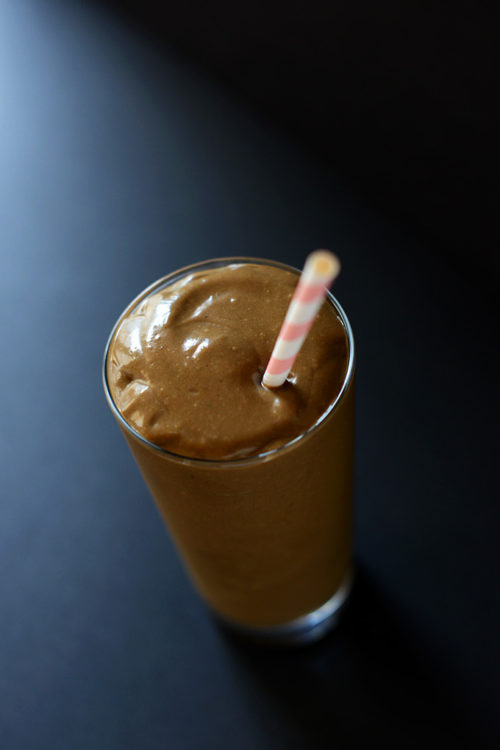 Drinking glass filled with our Triple Chocolate Avocado Shake recipe