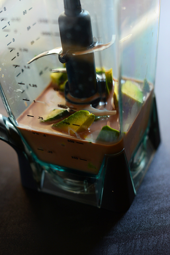 Blender with ingredients for making our Triple Chocolate Avocado Shake recipe