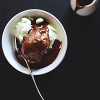 Bowl of mint chip ice cream covered in Vegan Kahlua Hot Fudge