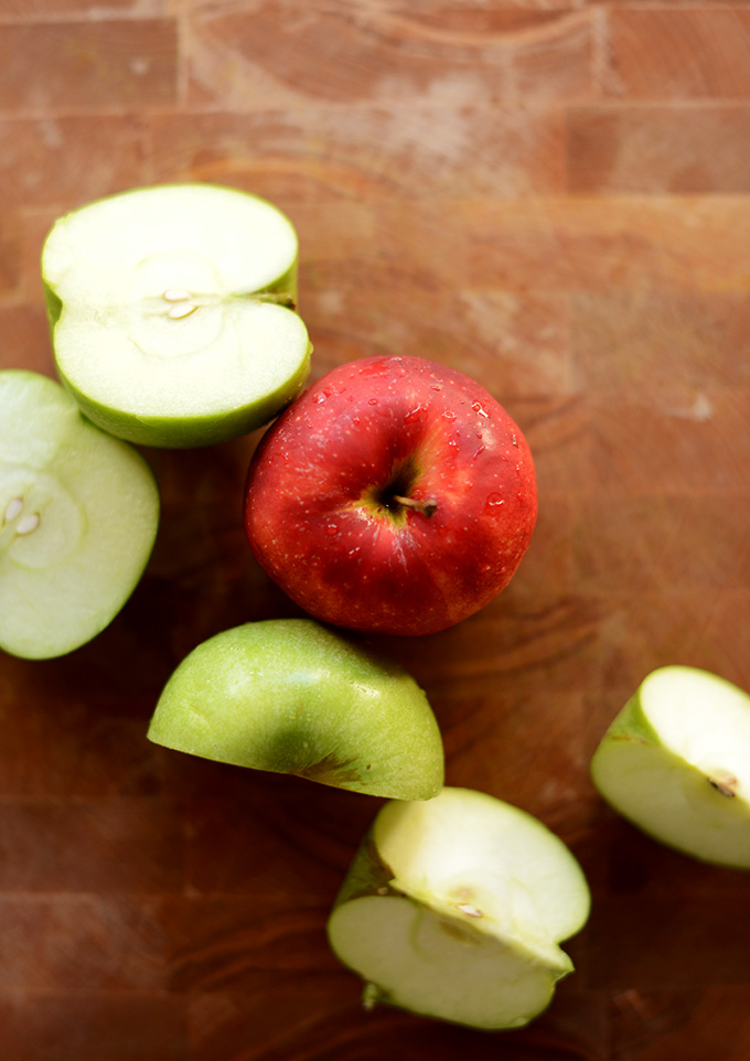 Whole and halved apples for making homemade Apple Waffles