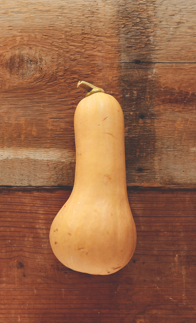 Fresh butternut squash ready to be cut open and roasted for salad