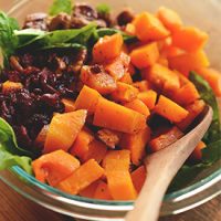 Glass bowl filled with Warm Roasted Butternut Squash Salad