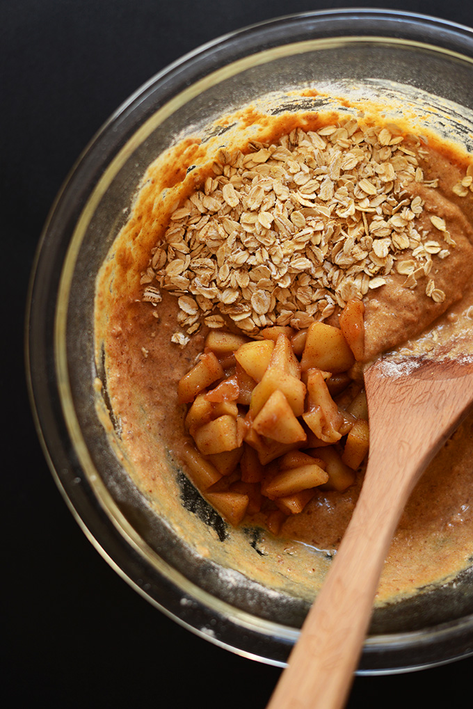 Stirring ingredients for homemade Cinnamon Apple Waffles
