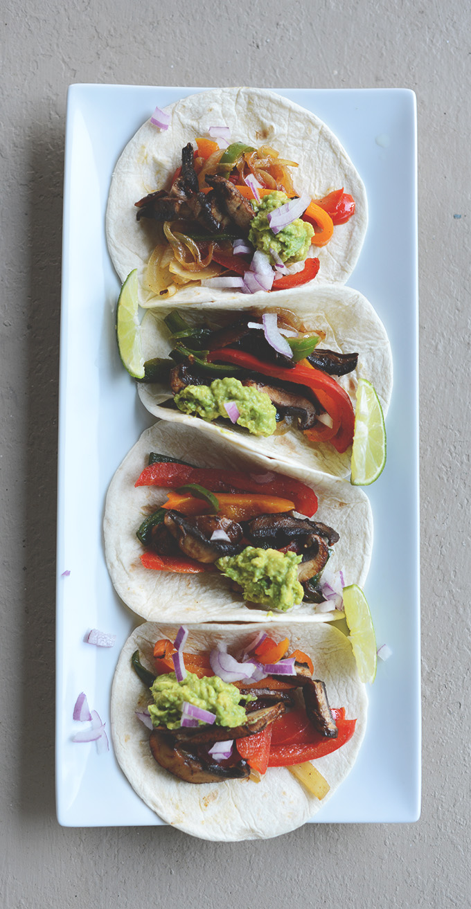 Platter of Easy Vegan Fajitas with lime wedges
