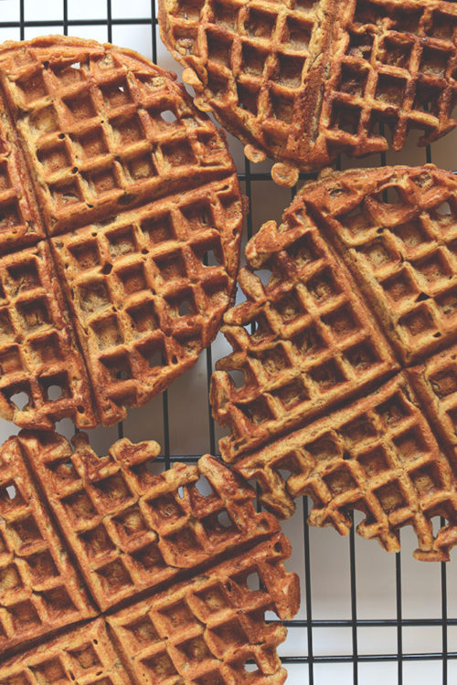 Batch of our Pumpkin Spice Latte Waffles recipe cooling a rack