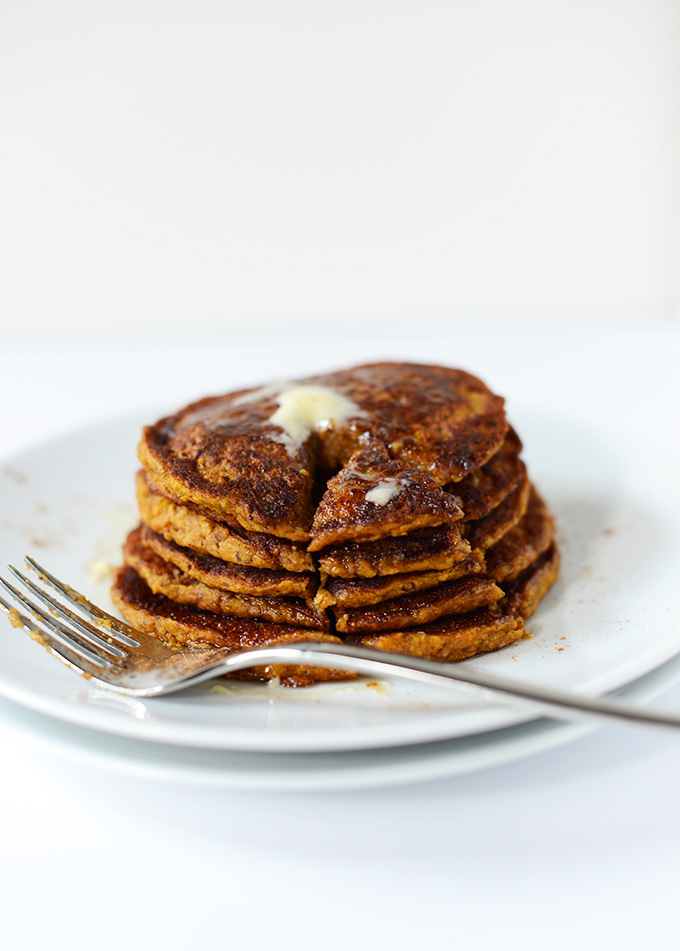 Slice cut out from a stack of Vegan Pumpkin Spice Pancakes