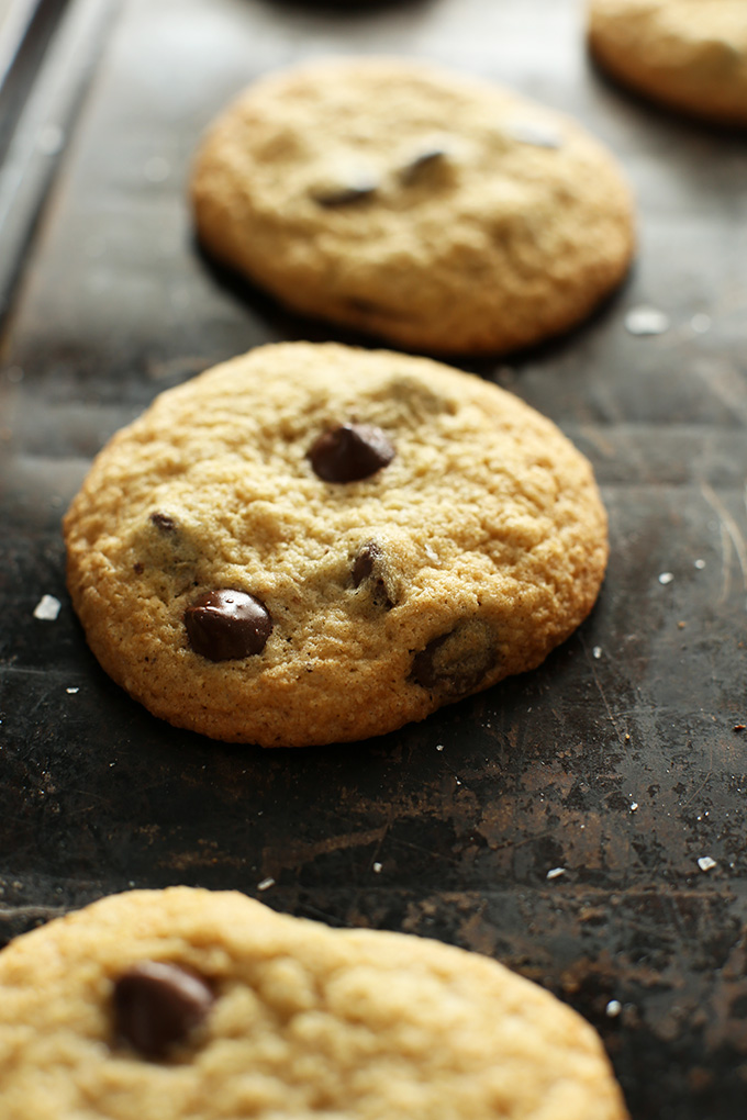 Baking sheet with several Gluten-Free Chocolate Chip Cookies