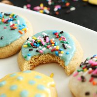 Plate of sugar cookies with Coconut Macadamia Frosting