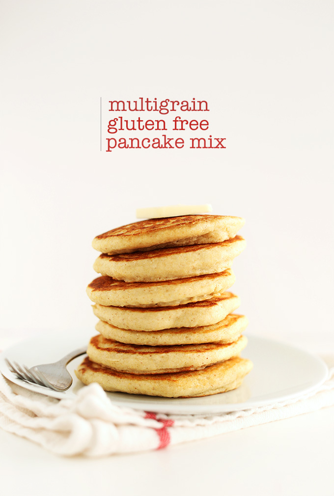Stack of Multigrain Gluten-Free Pancakes topped with a slab of vegan butter
