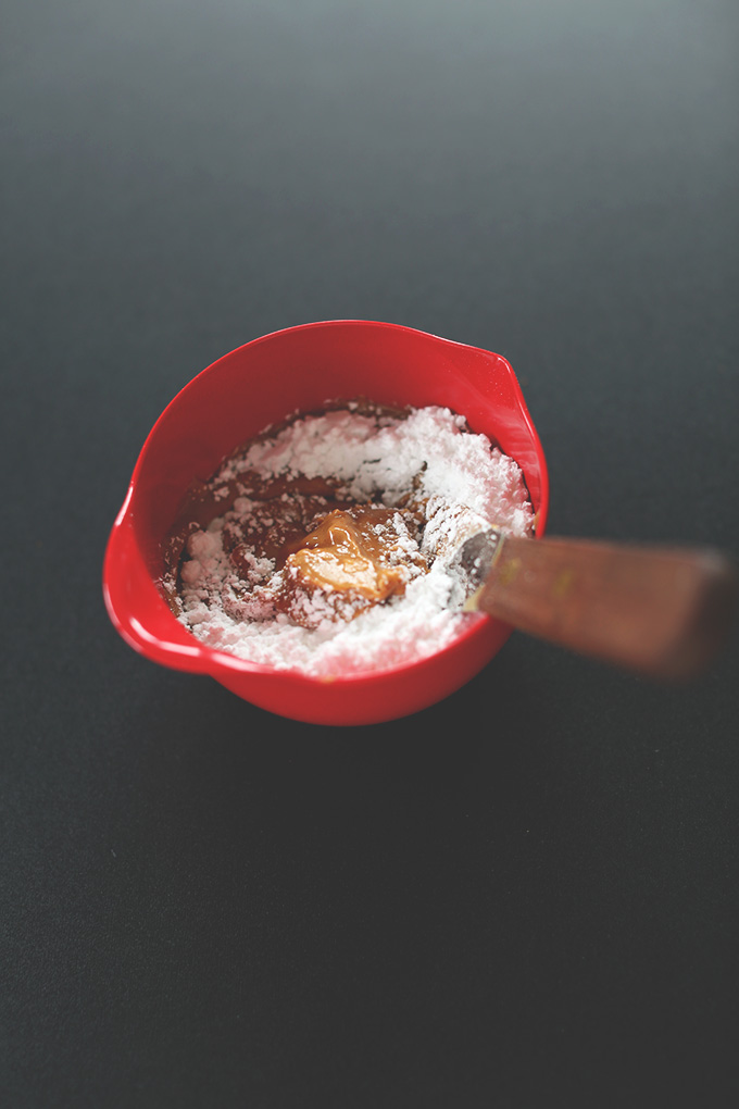Mixing peanut butter and powdered sugar to make the peanut butter swirl