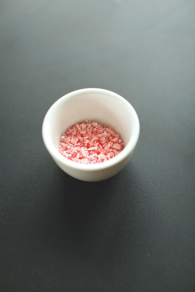 Small bowl of crushed candy canes for decorating Vegan Hot Chocolate