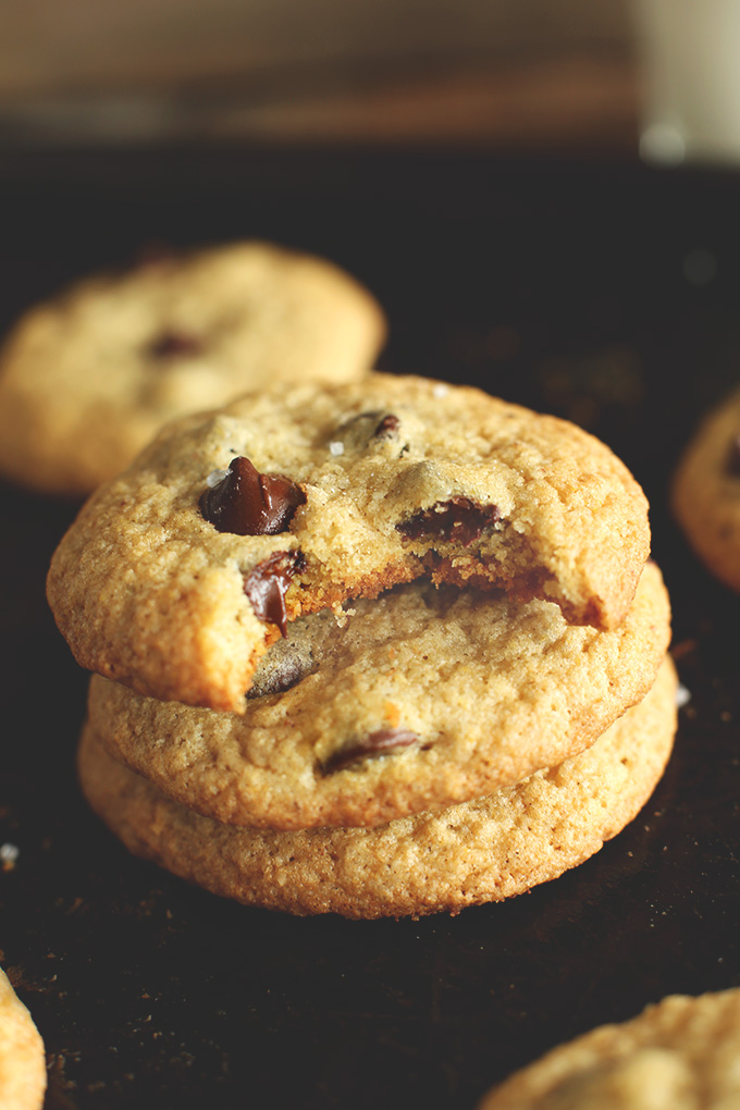 Revealing the soft and chewy texture of the top cookie on a stack of Gluten-Free Chocolate Chip Cookies