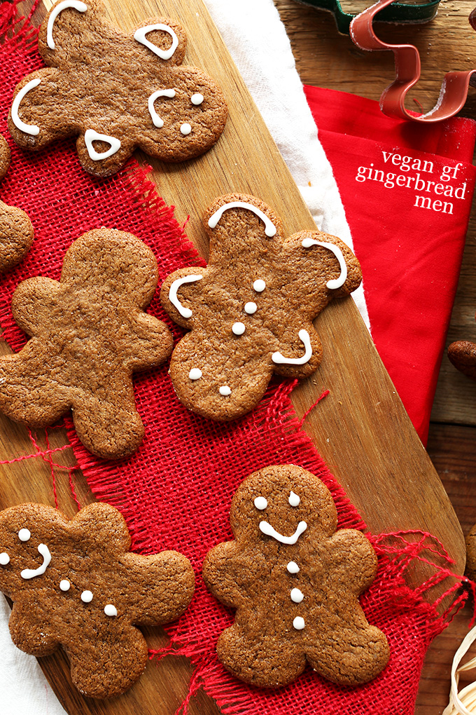 Vegan Gluten-Free Gingerbread Men on a wood cutting board