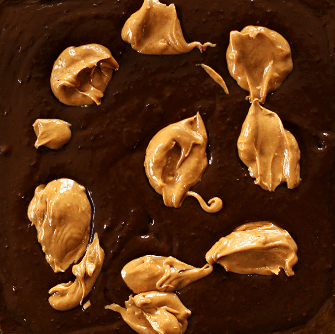 Showing step 1 for how to create a peanut butter swirl in brownies