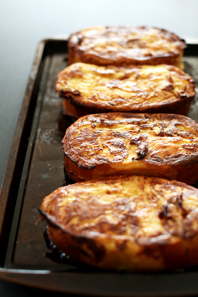 Slices of dairy-free Coconut Cream Pie French toast on a baking sheet