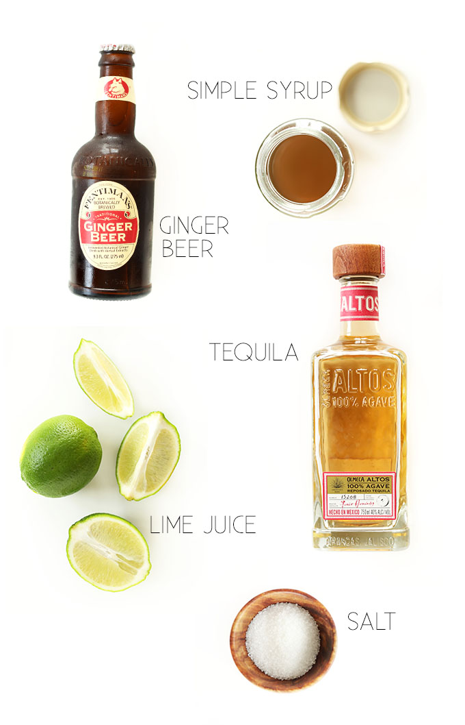 Simple syrup, ginger beer, tequila, limes, and salt for making homemade Ginger Beer Margaritas
