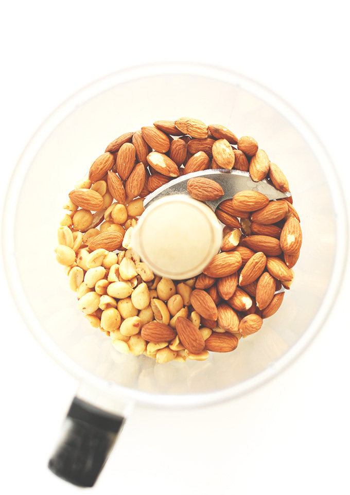 Food processor containing peanuts and almonds for making Peanut Butter Pretzel Truffles