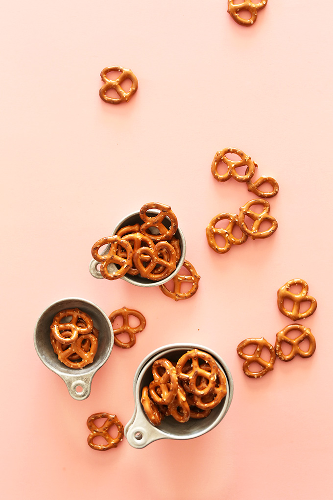 Pretzels in measuring cups and scattered about