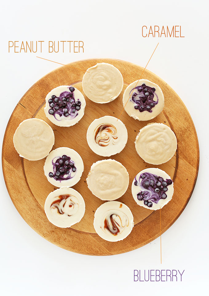 Cutting board filled with assorted flavors of our Vegan Cheesecake Bites recipe