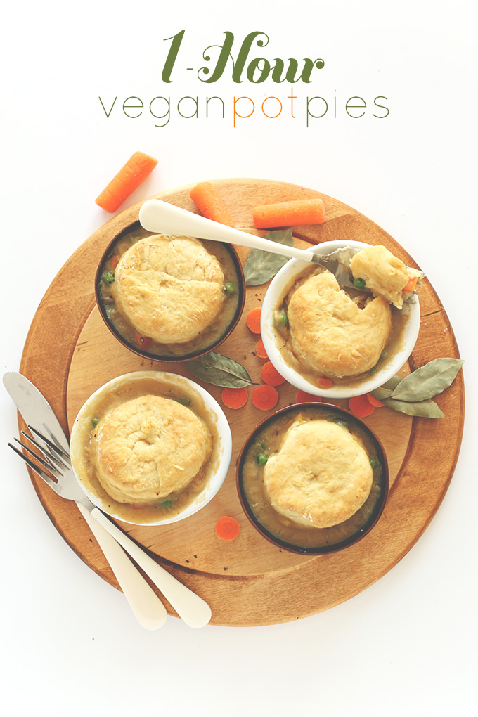 Fork resting on a ramekin of Vegan Pot Pie with other ramekins also on the cutting board