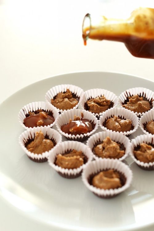Plate of partially made Bourbon Caramel Almond Butter Cups
