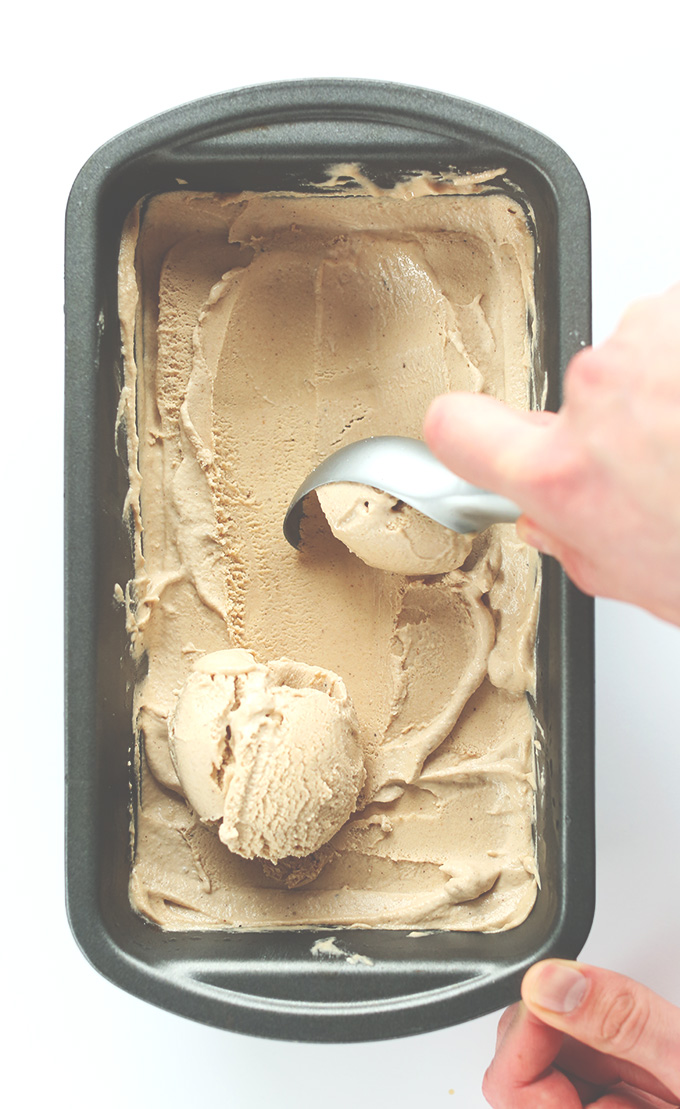 Scooping Spicy Chai Ice Cream for a delicious vegan dessert
