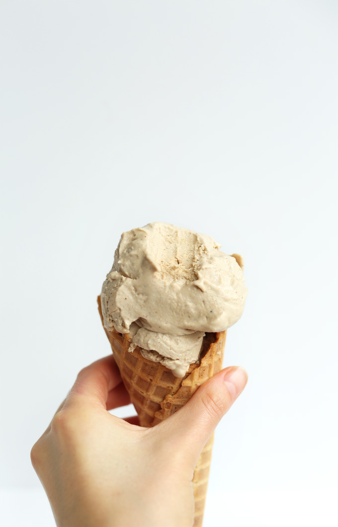 Partially eaten scoop of Creamy Vegan Chai Ice Cream on a cone