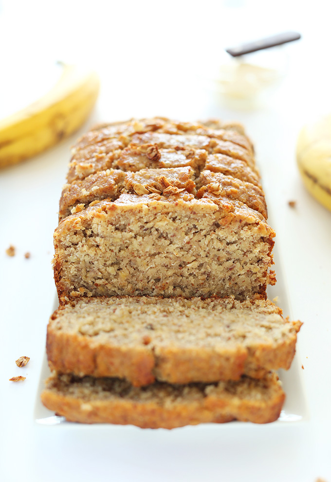 Partially sliced loaf of Gluten Free Whole Grain Banana Bread