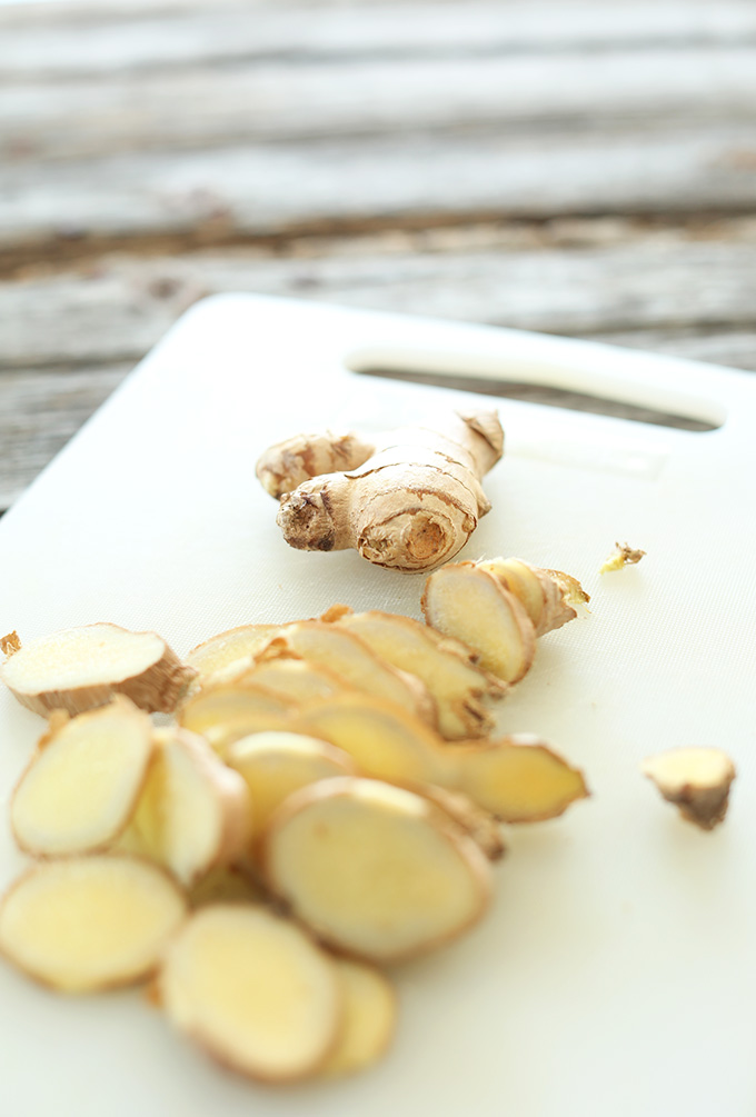 Sliced fresh ginger for vegan Ginger Lattes
