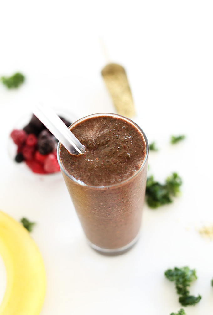 Glass of Hide Your Kale Smoothie made with kale, berries, and banana