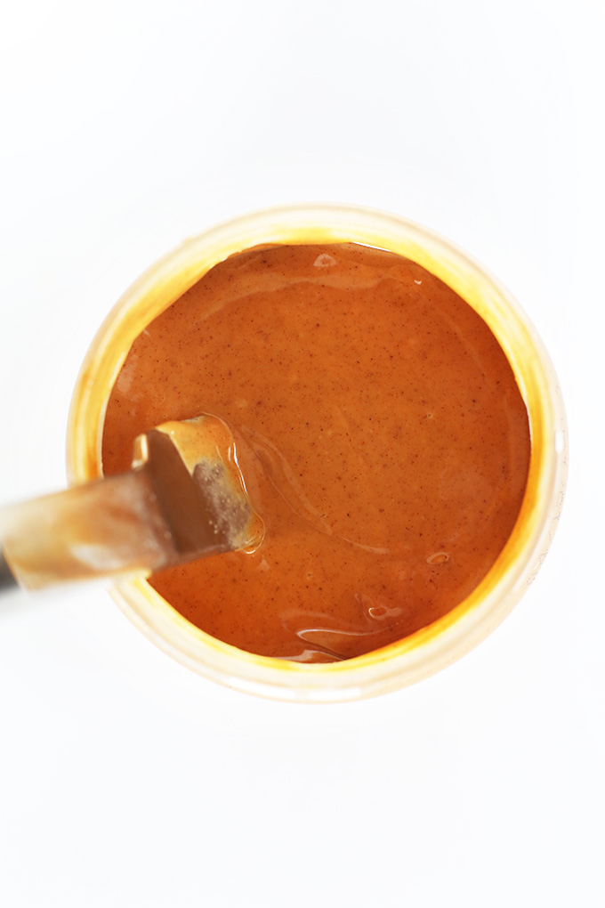 Butter knife in a jar of peanut butter
