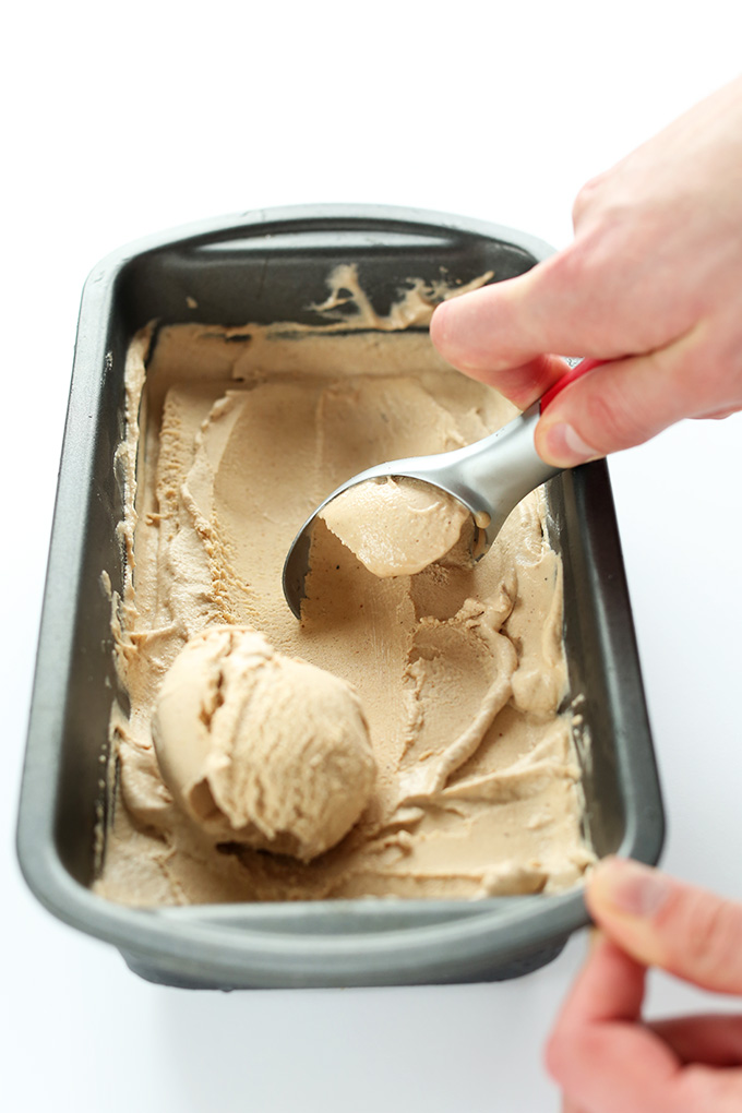Using an ice cream scooper to make scoops of Vegan Chai Ice Cream