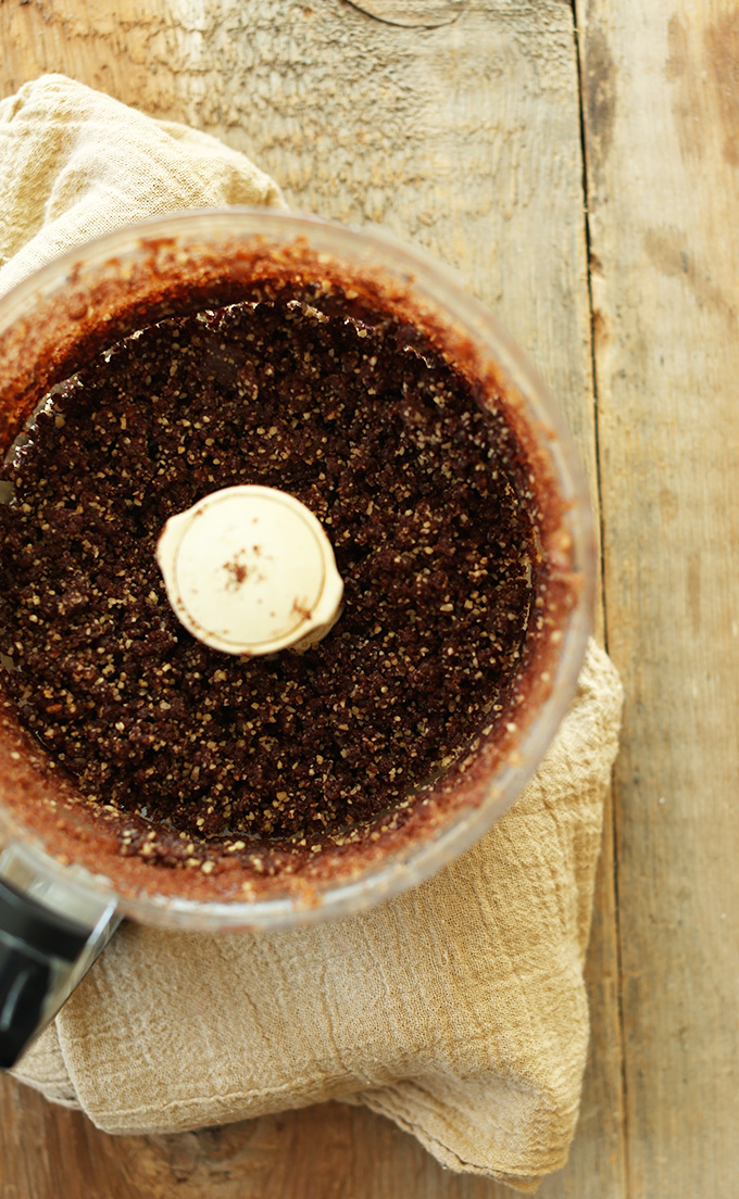 Food processor filled with 3-Ingredient Brownie Crust