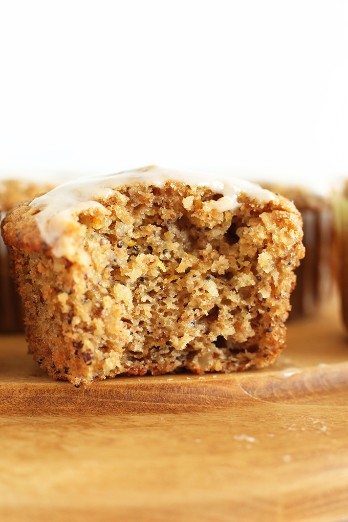 Showing the center of a Vegan Meyer Lemon Poppyseed Muffin with Lemon Glaze