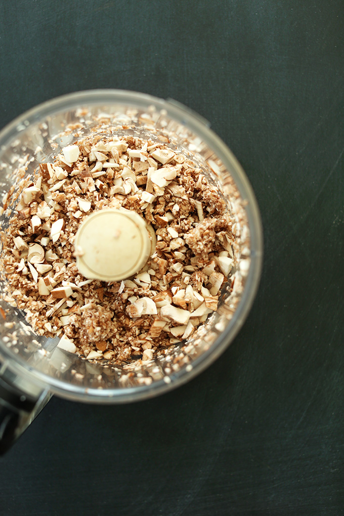 Food processor with ingredients for Mushroom Veggie Burgers