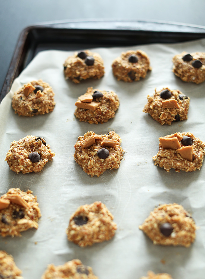 Baking sheet with gluten-free Double Peanut Butter Chocolate Chip Cookies ready to go in the oven