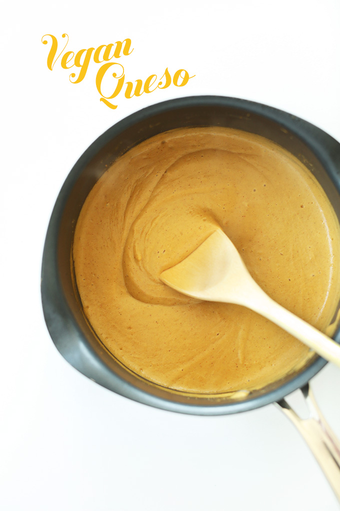Cooking Easy Vegan Queso in a saucepan