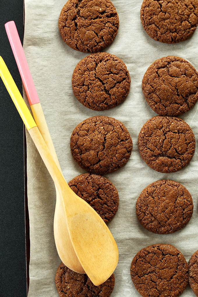 Parchment-lined baking sheet filled with Gluten-Free Vegan Ginger Cookies
