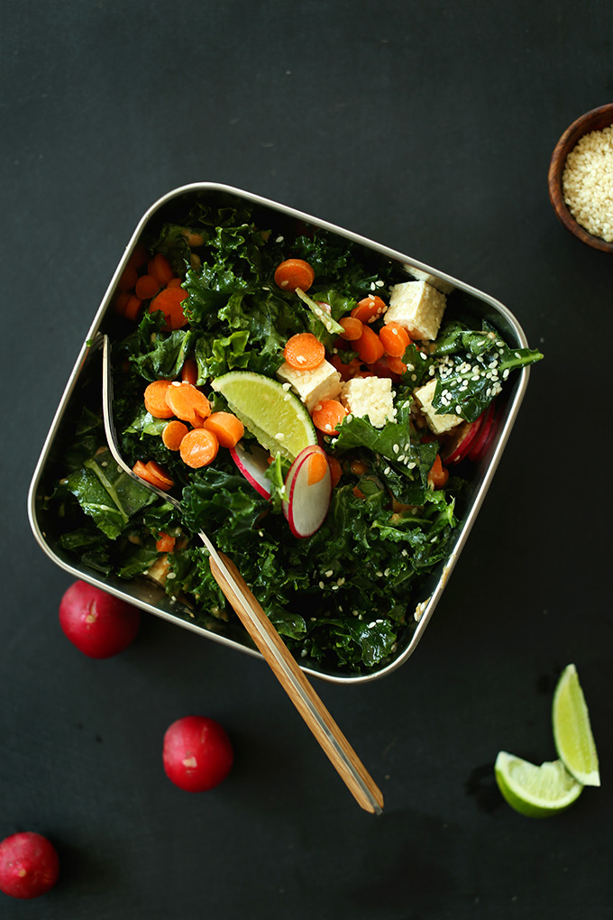 Stainless steel lunchbox filled with Massaged Thai Kale Salad