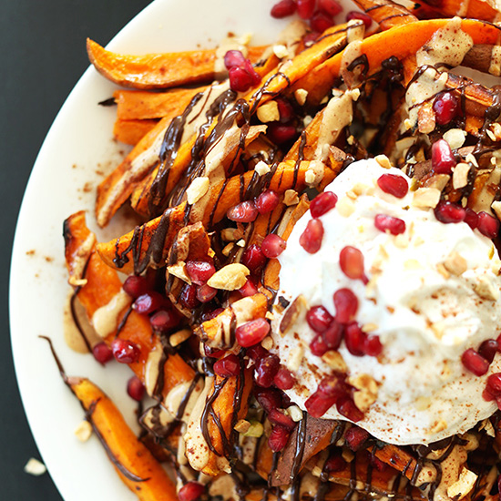 Plate of Superfood Sweet Potato Dessert Fries drizzled with chocolate syrup
