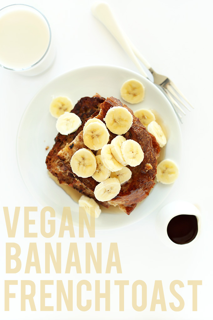Plate of Vegan Banana French Toast with sliced bananas and a glass of almond milk