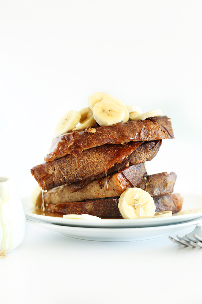Vegan Banana French Toast topped with freshly sliced bananas