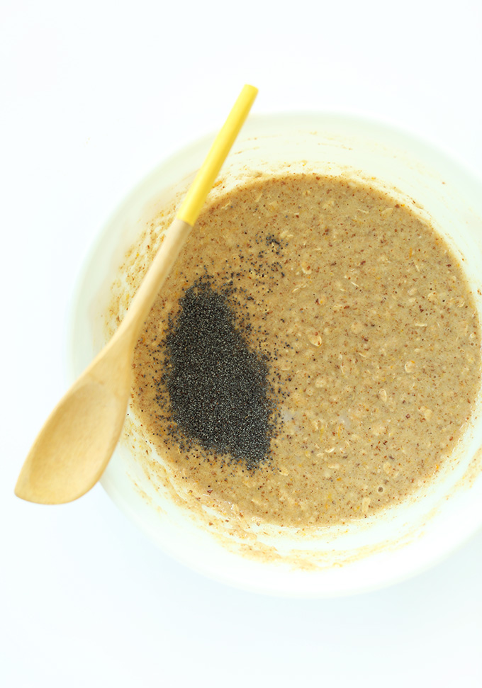 Bowl of Vegan Meyer Lemon Muffin batter topped with chia seeds