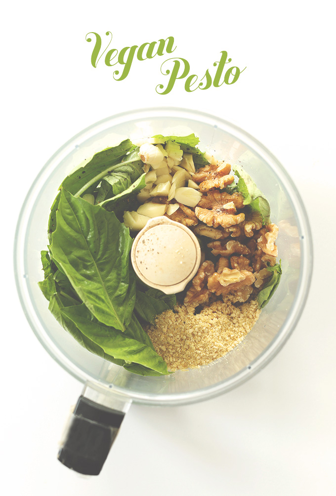 Food processor with ingredients for Vegan Pesto